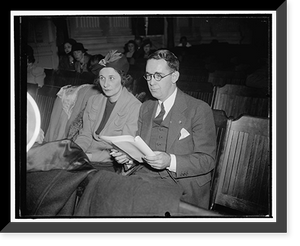 Historic Framed Print, Former NLRB member listens to successor testify before Smith Committee. Washington, D.C., Dec. 11.,  17-7/8" x 21-7/8"