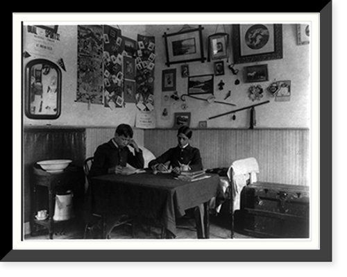 Historic Framed Print, [Carlisle Indian School, Carlisle, Pa. Two boys studying in dormitory room],  17-7/8" x 21-7/8"