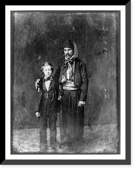 Unidentified man in Middle Eastern costume with arm around boy, full-length portrait, Antique Wall Art