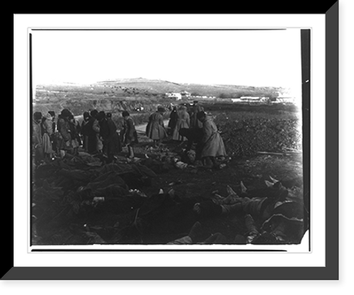 Historic Framed Print, [Russian dead strewn over the ground awaiting burial in one common grave - siege of Port Arthur],  17-7/8" x 21-7/8"