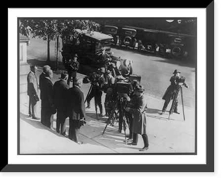 Elihu Root, Oscar Wilder Underwood, Charles Evans Hughes, Henry Cabot Lodge, Sr., and Mills, full-length portrait, standing, backs to camera, photographers with cameras in front of them Antique W