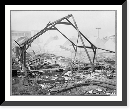 First U.S. Army Signal Corps photos of the bombing of Hawaii, Dec. 7, 1941: remains of tent barracks after fire caused by attack of Japanese bombers. Wheeler Field, Antique Poster