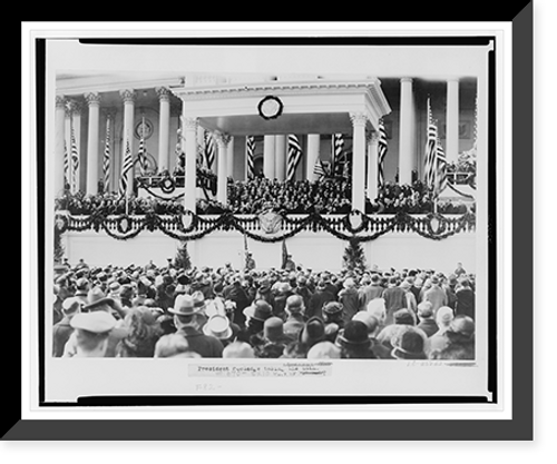 Historic Framed Print, [Chief Justice William H. Taft administering the oath of office to Calvin Coolidge on the east portico of the U.S. Capitol, March 4, 1925],  17-7/8" x 21-7/8"