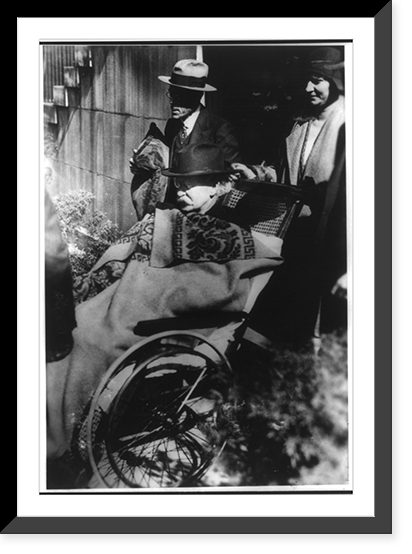 Albert B. Fall, three-quarter length portrait, facing left, in wheelchair, wrapped in et, at his bribary trial, October 12, 1929, Vintage Poster