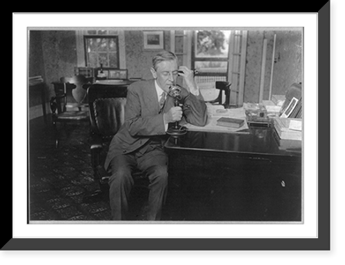 Historic Framed Print, [Woodrow Wilson, 1856-1924, full, seated, facing right, using telephone],  17-7/8" x 21-7/8"