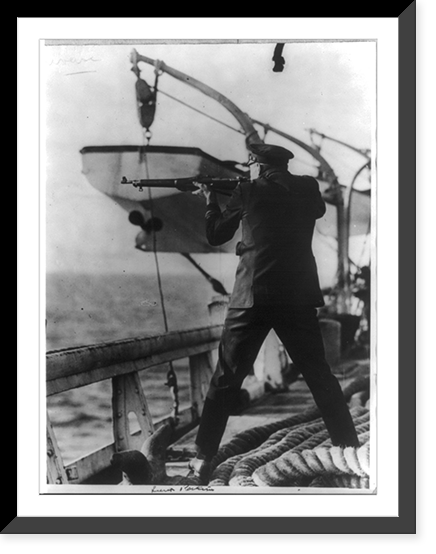 Historic Framed Print, [Coast Guard Cutter, USS Seneca chasing and capturing a rum runner" 1924: Lt. L.W. Perkins firing at fleeing boat]",  17-7/8" x 21-7/8"