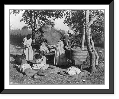 African-American woman doing laundry with a scrub board and tub, African-American girl stirring pot with 3 other children on the ground watching, and a woman in the background spreading laundry T