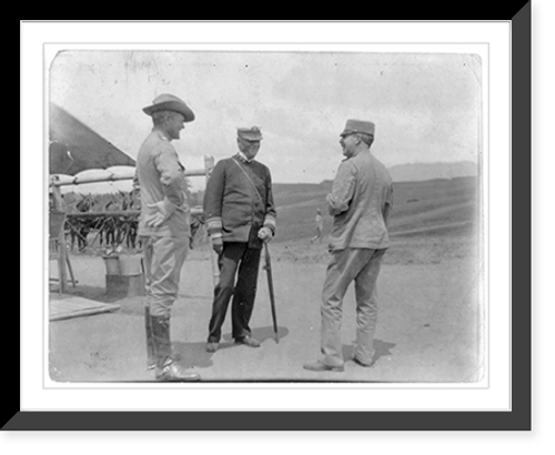 Historic Framed Print, American military installations and activities in the Philippine Islands, ca. 1885 to 1925: Gen. John J. Pershing and two officers (standing, facing each other),  17-7/8" x 21-7/8"