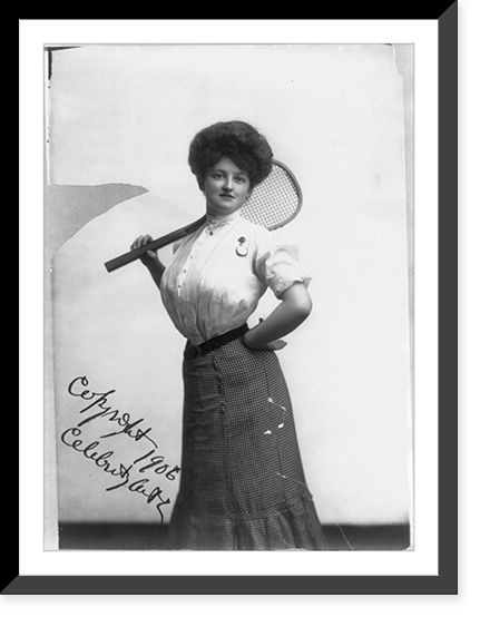 Historic Framed Print, [Tennis Girl" - woman posed with tennis racket on shoulder,  three-quarters length,  standing,  facing front]",  17-7/8" x 21-7/8"