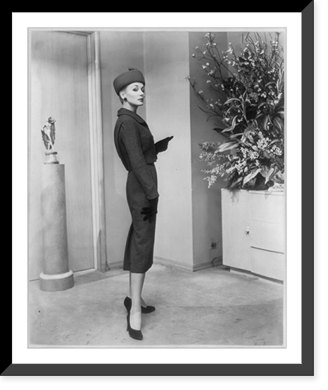 From the Fall 1956 collection of Adele Simpson. an imported wool tweed three-piece suit in Burma Ruby, Vintage Poster