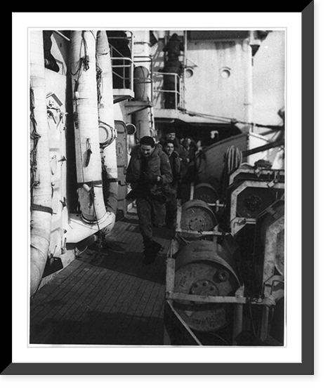 Coast Guardsmen running to their battle stations on the U.S. cutter SPENCER in the North Atlantic, after an enemy submarine had been contacted, Vintage Poster