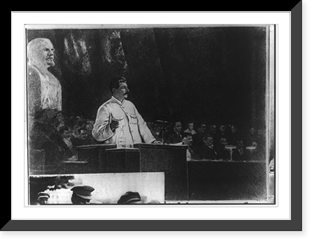 Stalin addressing 16th meeting of the Bolshevik Party; statue of Lenin in background, Historic Print