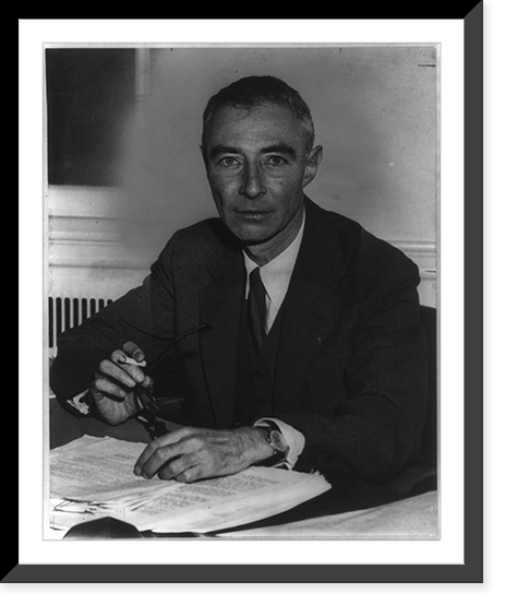 Historic Framed Print, [J. Robert Oppenheimer, 1904-1967, half-length portrait, seated at desk, facing left],  17-7/8" x 21-7/8"