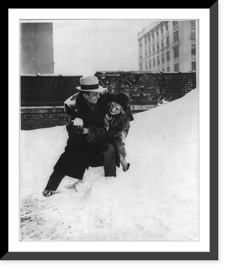 Snow time is playtime for Lew Kosloff and Peggy Leaf Lew Kosloff washing Miss Leaf's face with snow, Chicago, Ill, Vintage Poster