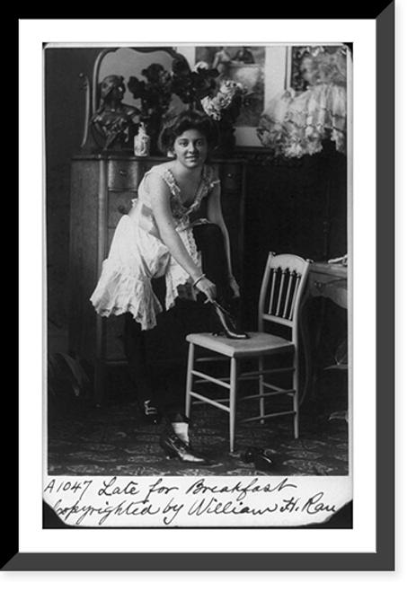 Historic Framed Print, [Young woman in glamourous, erotic poses: Late for Breakfast" - in negligee,  putting on high-button shoes]",  17-7/8" x 21-7/8"