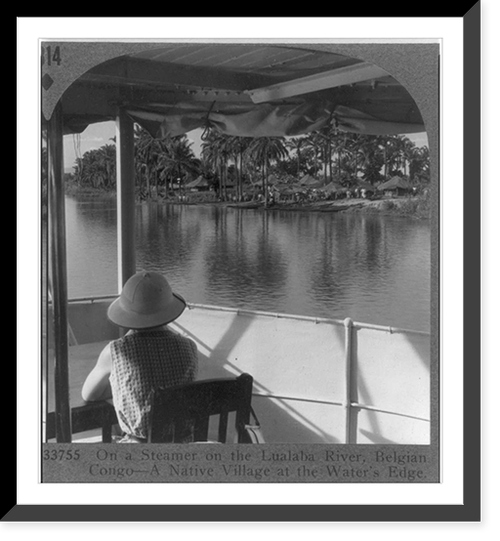 On a steamer on the Lulalaba River, Belgian Congo - a native village at the water's edge, Historic Reproduction