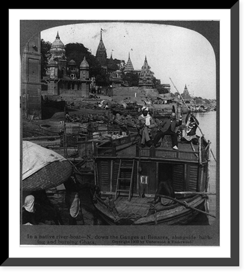 Historic Framed Print, In a native river boat - N. down the Ganges at Benares, alongside bathing and burning Ghats,  17-7/8" x 21-7/8"