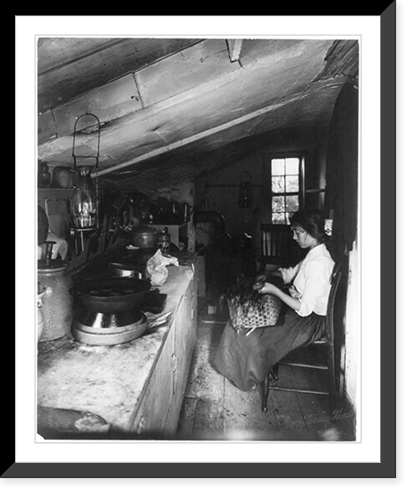 Evelyn, a little native maid seated in kitchen with basket on her lap, Vintage Wall Art