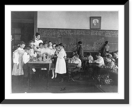 Historic Framed Print, [Classroom scene in Washington, D.C. elementary school - children working with blocks and at blackboard in mathematics class],  17-7/8" x 21-7/8"