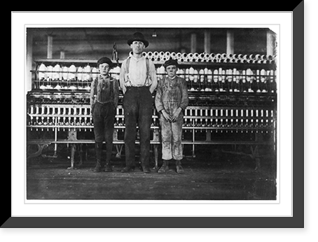 Historic Framed Print, Overseer and two of the doffer boys, Charles Hennessy and John Douglass in Avondale Mills. Noon hour. Overseer said, we've got 30 of 'em." Location: Birmingham,  Alabama.",  17-7/8" x 21-7/8"