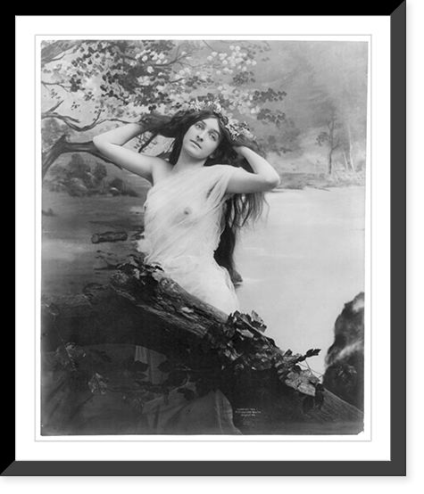 Historic Framed Print, [Young woman modeling: nude with garland of flowers],  17-7/8" x 21-7/8"