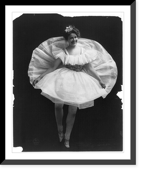 Woman posed, full-length, standing, facing front, wearing ballet costume, with back of skirt raised behind her, Vintage Print