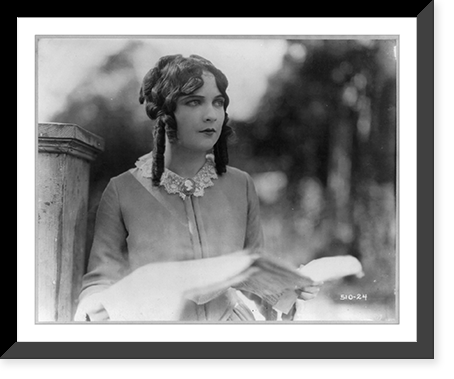 Unidentified woman, once thought to be Mary Pickford, half-length portrait, holding papers, facing slightly right Classic, Antique Print