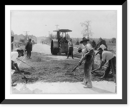 Section of the national highway, Roxboro Road, in Durham County, N.C. - Men laying a two-inch warrenite surface on a five-inch concrete foundation, Historic Reproduction