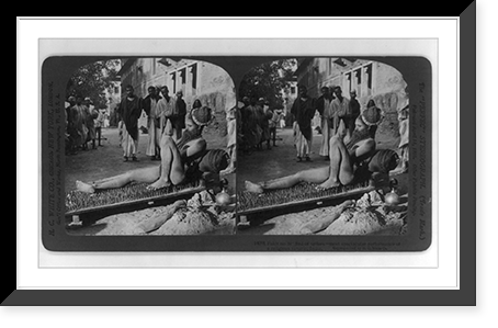 Fakir on his bed of spikes - most spectacular performance of a religious fanatic, India, Vintage Print