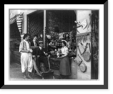 Pan-American Exposition, Buffalo, N.Y., 1901: Man in wheeled chair at souvenir shop with 4 other persons, Historic Print