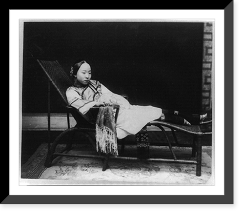 Historic Framed Print, Woman with bound feet reclining on chaise lounge, China,  17-7/8" x 21-7/8"