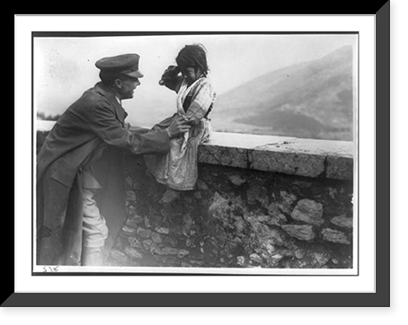 Historic Military - War orphan from the Appenines seated on wall
