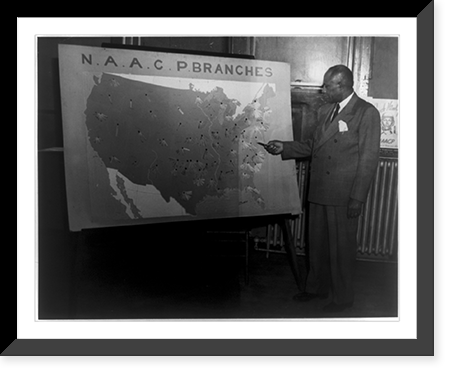 Carl R. Johnson pointing to a map of the U.S. showing locations of NAACP branches Classic, Vintage Poster