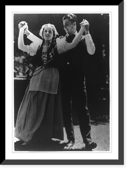 Man and woman of the Acadian country in America, in native attire, doing dance of French origin at the Americn National Folk Festival, Philadelphia, Antique Poster