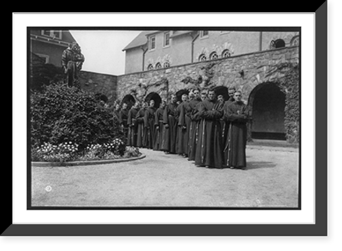 Historic Framed Print, [Franciscan Friars of the Atonement, Graymoor, Garrison, N.Y. Monks posed double file in courtyard],  17-7/8" x 21-7/8"