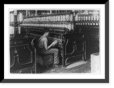 King Philip Spinning room. Oiler Boy - Oils all the spindles in this room. George Courtemonds, 114 Kellogg St. October 3, 1915, 14 years old. Location: Fall River, Massachusetts.Lewis W. Hine. Clas