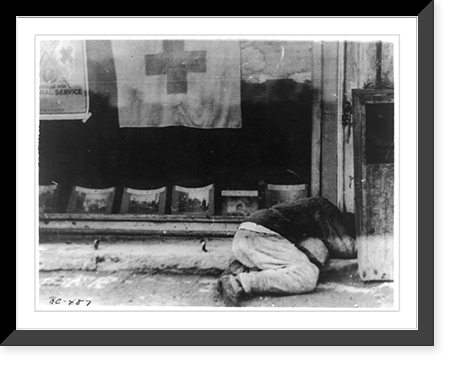Russian man collapsed from typhus under window with Red Cross banner, at building where care could be given him, Siberia, Antique Wall Art