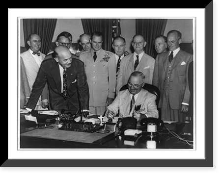 President Truman signing the new Unification Bill, Vintage Print