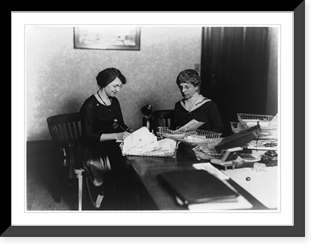 Florence Kling Harding, half-length portrait, seated at desk with another woman, facing left Classic, Vintage Poster