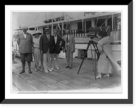 Pres. Harding and four other people being filmed on dock by Mrs. E.B. McLean, Historic Print