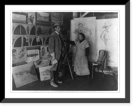 Miss Luvena Buchanan, sculptress, sketching Harold Bell Wright, author of The winning of Barbara Worth, and paintings from original characters in the novel, in Barbara Worth Hotel, El Centro, Ca. H