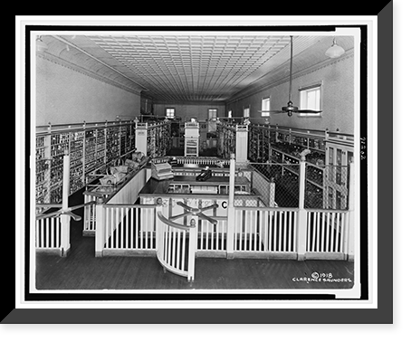 Interior of a Piggly Wiggly self-service grocery store in or near Memphis, Tenn., with two turnstiles in foreground, Vintage Poster