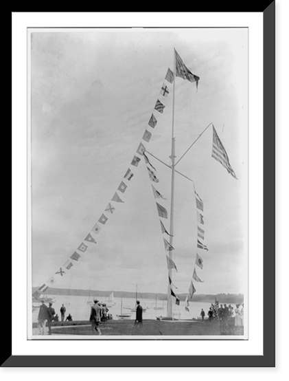 Pole with flags of different countries; sailboats in background, Oyster Bay, Long Island, N.Y, Historic Reproduction