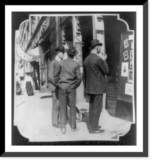 Three men standing outside motion picture theater, (Denver, Colorado?), Historic Print