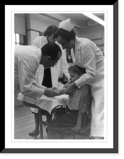Dr. Jonas Salk innoculating a boy, as two nurses assist him, Vintage Poster