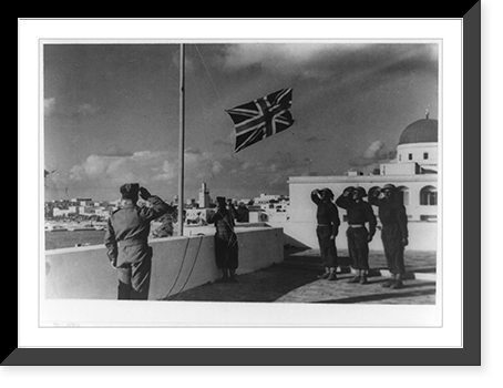 The Union Jack being hoisted on an Italian flagpole in Benghazi after the city's recapture, showing British soldiers saluting, Vintage Wall Art