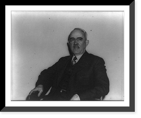 Morris L. Cooke, half-length portrait, seated, facing front, Antique Poster