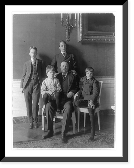 Theodore Roosevelt, full-length portrait, seated, facing front, with his four sons posed around him, Antique Print