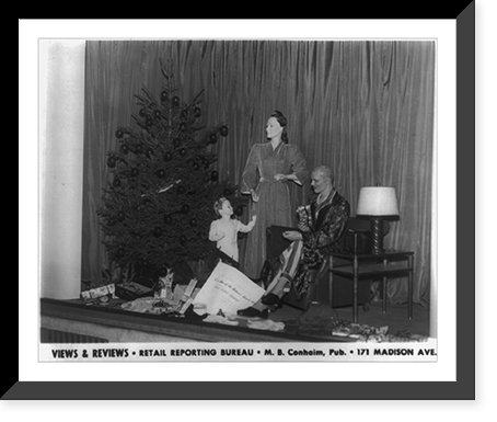 Views & reviews. Arnold Constable store window display with three mannequins with gifts and a Christmas tree, Historic Print