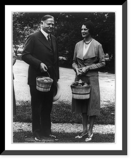 President Hoover standing with basket of peaches and Miss Virginia Haller, Peach Queen of the Michigan Orchards, who presented him with the peaches Classic, Vintage Wall Art